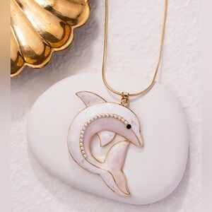 Elegant Gold and White Dolphin Pendant Necklace